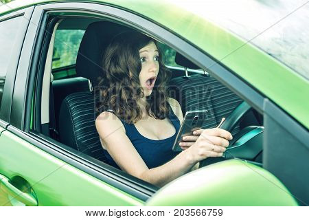 Driver Woman With A Phone In Hands Makes An Accident. Fright, Inconsiderate And Dangerous Driving. T