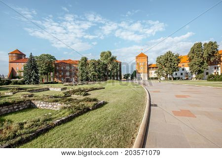 KRAKOW, POLAND - August 15, 2017: View on the inner courtyard of Wawel castle with garden and towers during the sunny morning in Krakow
