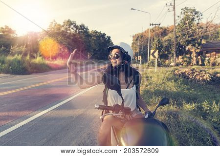 Attractive Woman Enjoy Sun Flare On Motorcycle Wear Helemt On Countryside Road Pretty Woman Motorcyclist Travel On Motorbike Summer Trip Concept