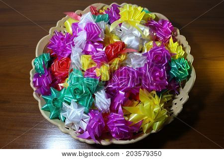 Set ribbon folded into a flower. Wrap coins by hand. for the sacred(ordination ,matriculation ,initiation) in Thailand