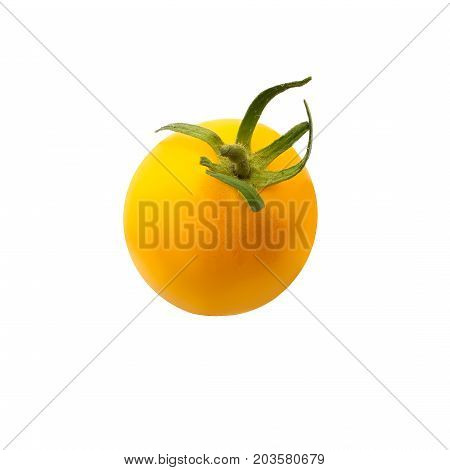 Fresh single yellow tomato close up isolated on white background. Top view