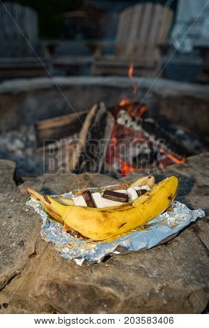 Campfire Banana Smores prepared by the fire pit.