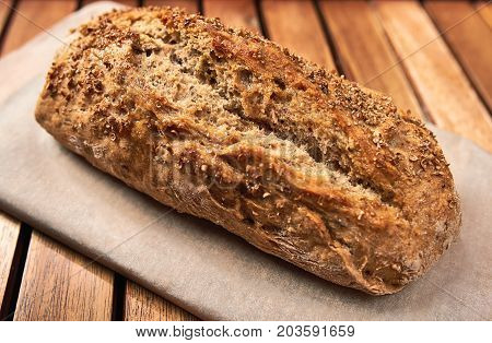 Loaf Of Homemade Bread On Wooden Background, Food Closeup.