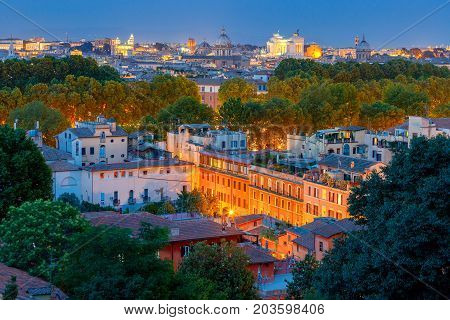 Aerial view of Rome from the hill Janiculum on the sunset. Italy.