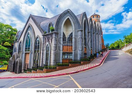TAIPEI TAIWAN - JULY 05: This is the architecture of the Aletheia University building and Oxford college which is an historical landmark in Tamsui on July 05 2017 in Taipei