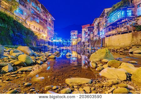 Night view village and river in Taiwan