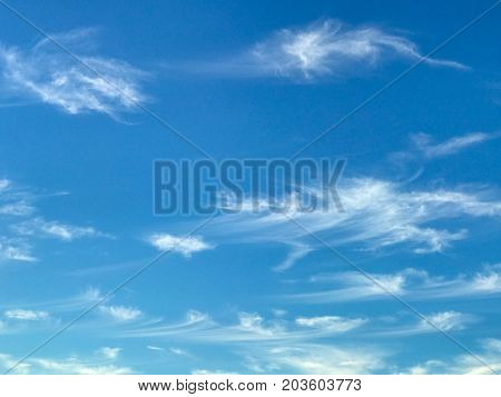 Beautiful white clouds on blue sky background