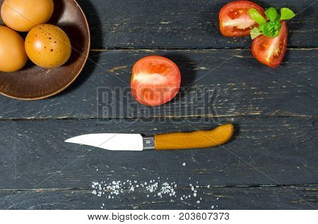 Slicing Tomatoes With A Pocket Knife.