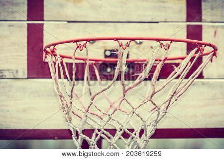 Sport recreation outside concept. Closeup of old vintage wooden basketball board outdoor