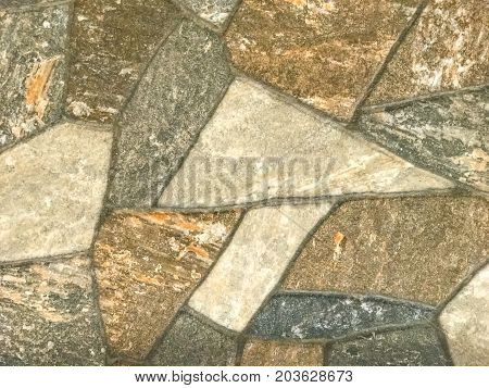 Close up of stone tiles floor background.