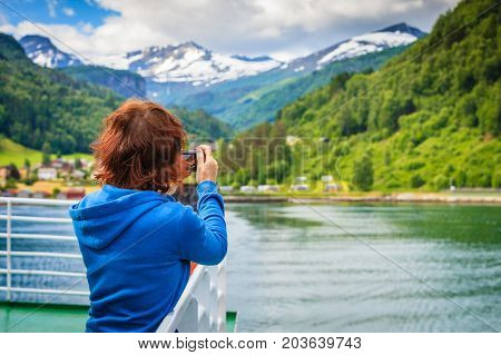 Tourist Woman On Liner Taking Photo, Norway