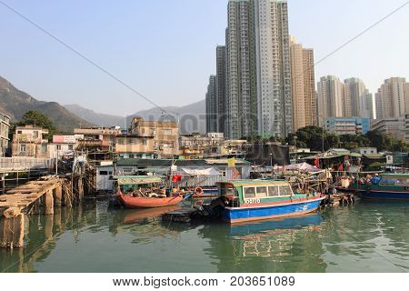 HONG KONG - JAN 1, 2015: View of fishing village in Tung Chung in Hong Kong on Jan1, 2015. Tung Chung village is a landmark historic village on Lantau Island in Hong Kong.
