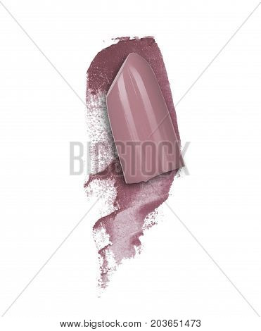 Taupe lipstick smear with a slice of lipstick closeup isolated on a white background