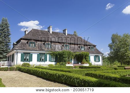 JANOWIEC, POLAND - AUGUST 9, 2017:  18th century polish manor house Janowiec Poland.The building was moved from the village of Moniaki now it is located in the open-air museum
