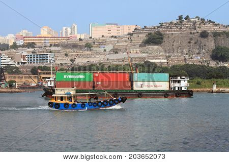 HONG KONG, CHINA - OCT 6, 2014: View of Rambler Channel on Oct 6, 2014 in Hong Kong, China. Many boats and ships pass through this busy logistics hub in Hong Kong.