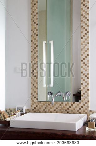 White washbasin and Gift Bath in clean restroom.