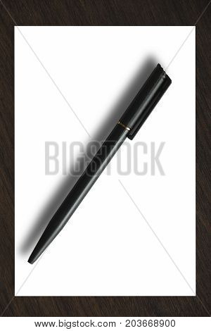 Blank paper with black pen. White paper and black pen on wooden table.