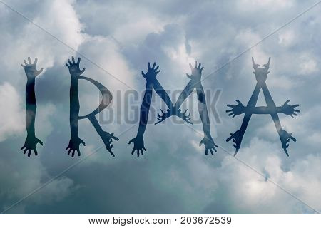 Hurricane Irma. Inscription on stormy sky background.