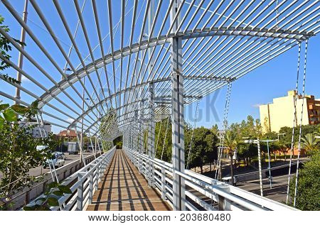 Bridge raised on highway and road for pedestrians