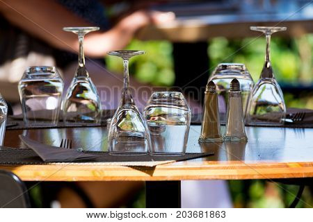 Empty Wine Glasses On The Table Served For Lunch, Dinner In Cafe, Restaurant Outside Or On Terrase