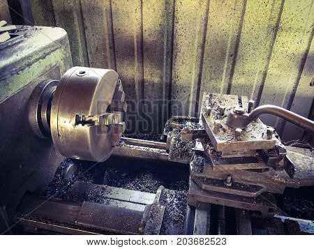 close up photo of old metal lathe.