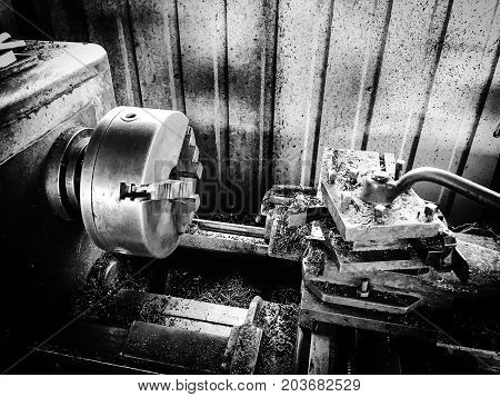 close up photo of old metal lathe.