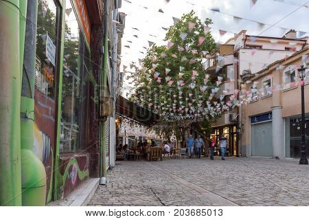 PLOVDIV, BULGARIA - AUGUST 22,  2017: Street in district Kapana, city of Plovdiv, Bulgaria
