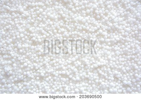 Photo of white saltpeter texture consist of many little balls