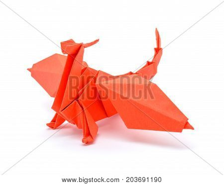 Photo of beautiful origami red gragon isolated on white background