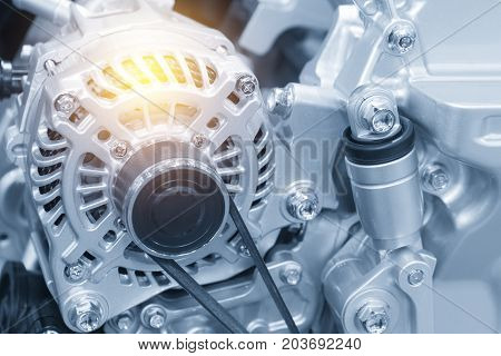 The car alternator in the light blue scene with the lighting effect.Automotive part.