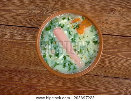 Kartoffel-Cremesuppe. potato soup with Vienna sausage , close up tradition meal