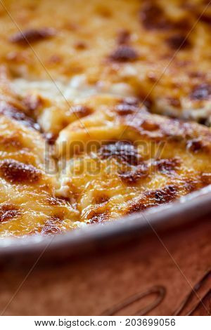 Pastitsio Traditional Greek Baked Pasta Casserole With Ground Beef, Tomatoes, Feta Cheese And Becham