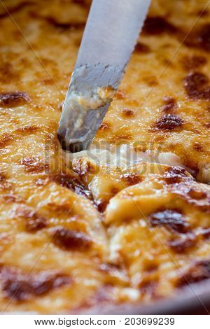 Pastitsio Traditional Greek Baked Pasta Casserole With Ground Beef, Tomatoes, Feta Cheese And Becham
