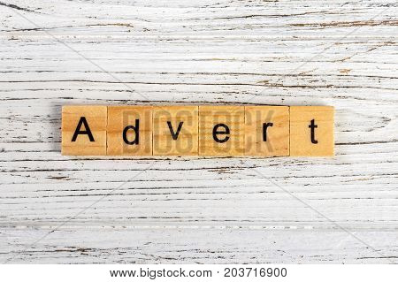 ADVERT word made with wooden blocks concept