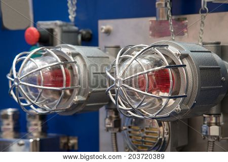 Industrial explosion-proof lantern of black and gray shines with white light at coal mining exhibition