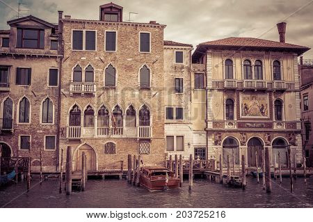 Traditional view of the street in Venice, Iyaly. Old houses on the Grand Canal. The Grand Canal is the main street and tourist attraction in Venice.