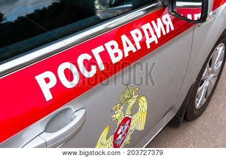 Samara Russia - September 10 2017: Inscription "Rosgvardia" and emblem of the troops of the National Guard of the Russian Federation on the board of car. Rosgvardia is the internal military force of the government of Russia. Text in russian: "Rosgvardia"
