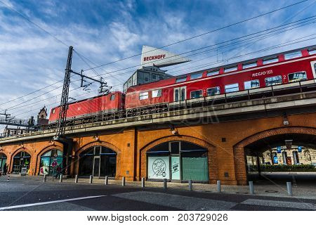 BERLIN - MARCH 08 2015: City life. Railroad overpass near the Zoologischer Garten and Neues Kranzler Eck. Toning. Stylization.