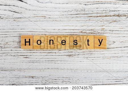 HONESTY word made with wooden blocks concept