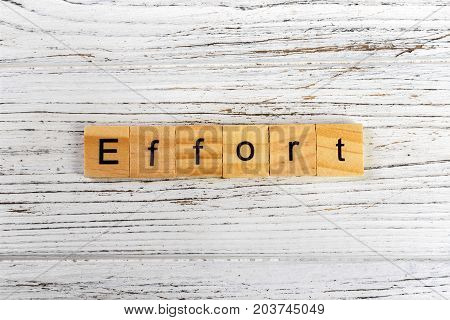 EFFORT word made with wooden blocks concept