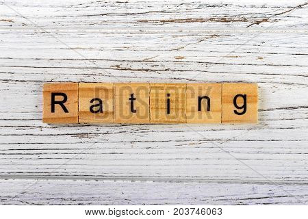 RATING word made with wooden blocks concept