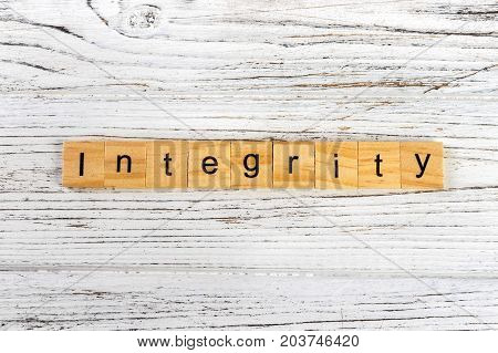 Integrity word made with wooden blocks concept