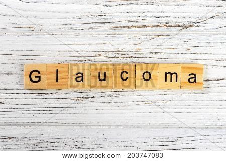 GLAUCOMA word made with wooden blocks concept