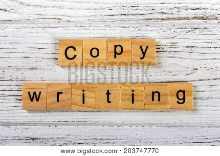 copywriting word made with wooden blocks concept