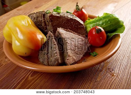 sliced rare roast beef farm-style.farmhouse kitchen , close up meal