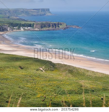 Whitepark Bay in Ballintoy, Antrim, Northern Ireland on a beautiful summer day