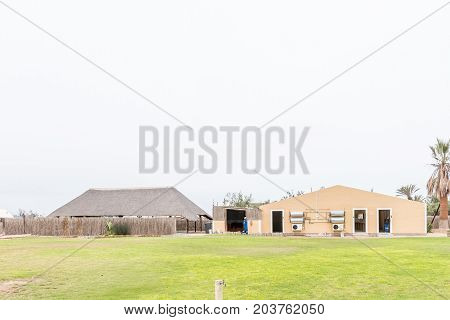 SWAKOPMUND NAMIBIA - JUNE 29 2017: A lapa and the ablution facilities at Tiger Reef Rest Camp in Swakopmund in the Namib Desert on the Atlantic Coast of Namibia