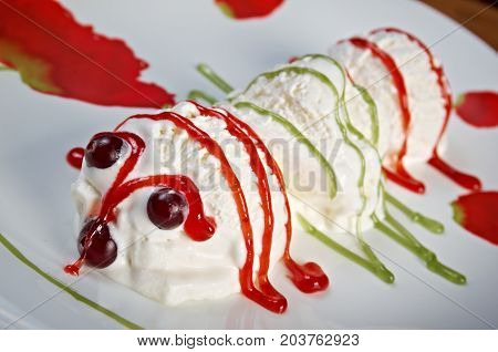 Kids Food..Fun caterpillar from ball icecream , close up