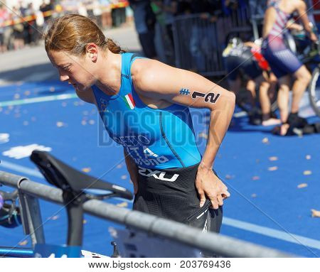 STOCKHOLM - AUG 26 2017: Triathlete Alice Betto (ITA) change clothes in the transition zone in the Women's ITU World Triathlon series event August 26 2017 in Stockholm Sweden