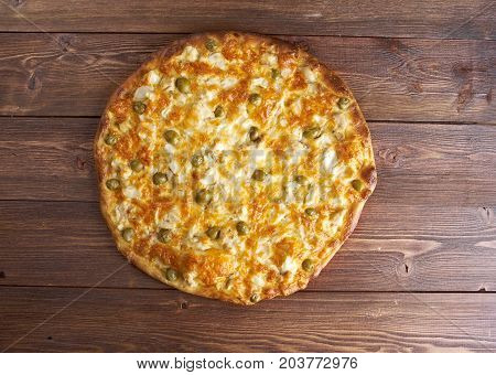 homemade pizza with rockfish . , close up